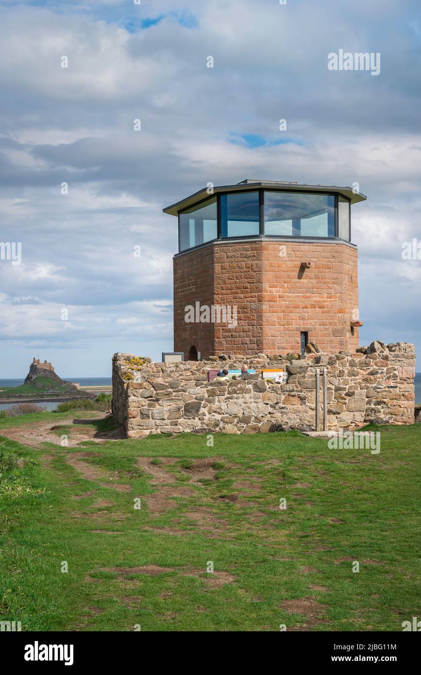 Lookout Tower Lindisfarne, view of the Lookout Tower on Heugh Hill - a visitor centre providing panoramic views of Holy Island, Northumberland, UK Stock Photo