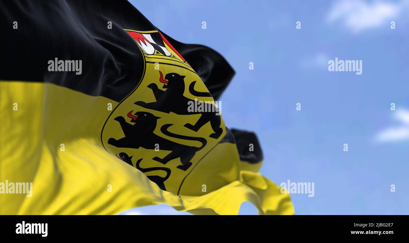 The flag of Baden-Württemberg waving in the wind on a clear day. Baden-Württemberg is a German state (Land) situated in southwestern Germany Stock Photo