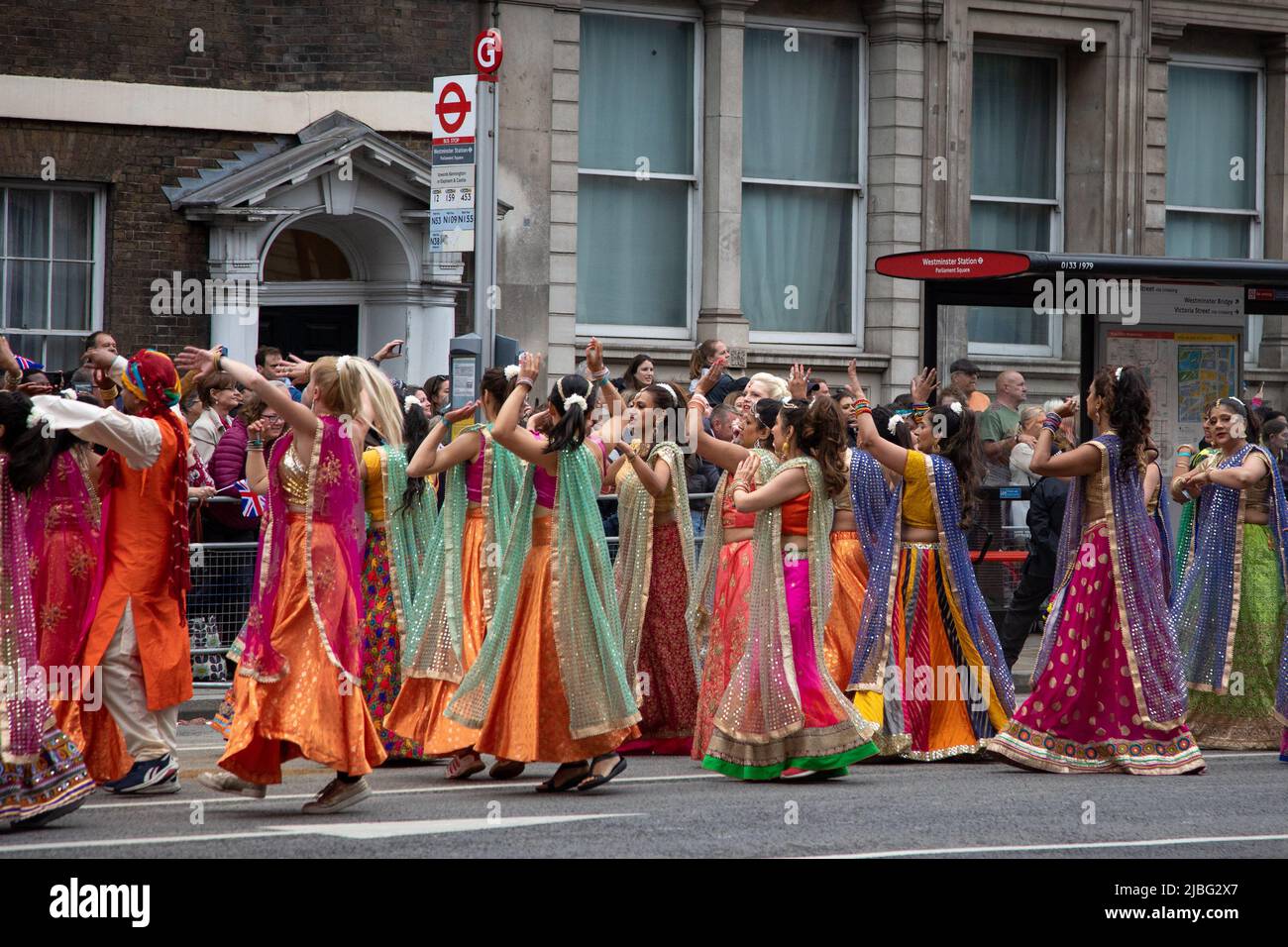 London, UK. 5th June 2022. An Indian wedding party complete with musicians, a huge cake and giant puppets was part of the 7-thousand-people strong Platinum Jubilee Pageant held in central London to mark her Majesty's 70 years on the throne. The colourful parade made its way along Whitehall, the Mall and past Buckingham Palace and was described by many as a once in a lifetime event. Credit: Kiki Streitberger / Alamy Live News Stock Photo