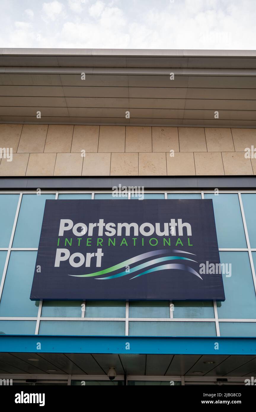 Portsmouth International Port showing buildings, sign at the international ferry terminal and transport hub UK Stock Photo