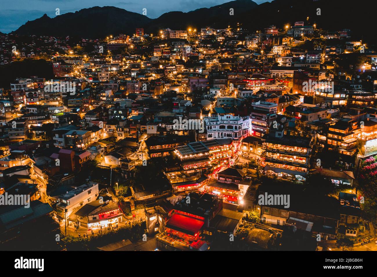 aerial view of night scene of Jioufen village, Taiwan. The colourful scene at night of Jiufen old city, Jiufen, Taiwan. Stock Photo