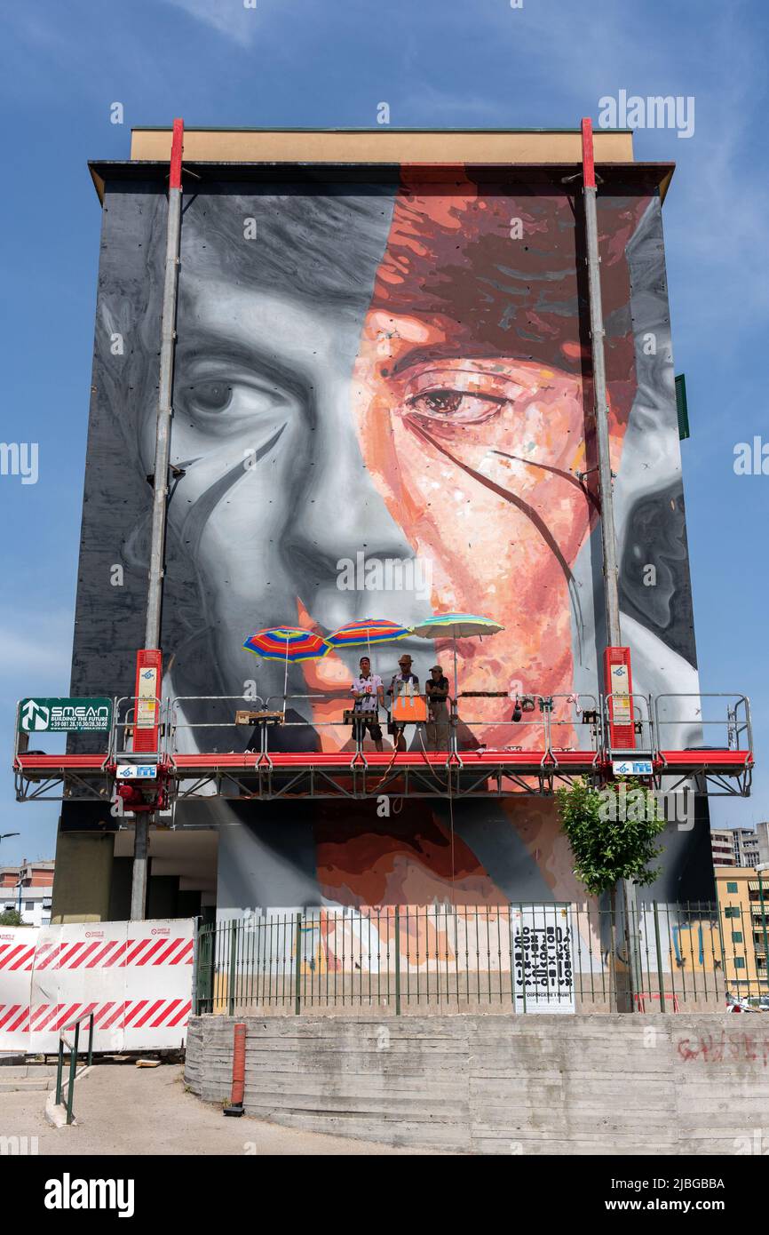 Naples, Italy. 06th June, 2022. Mural created in Scampia by the street artist Jorit in collaboration with Trisha. The latter portrayed Fabrizio De Andrè. The work was created on the occasion of 'Muraria', a festival promoted by the Municipality of Naples with funding from the Metropolitan City, Credit: Independent Photo Agency/Alamy Live News Stock Photo