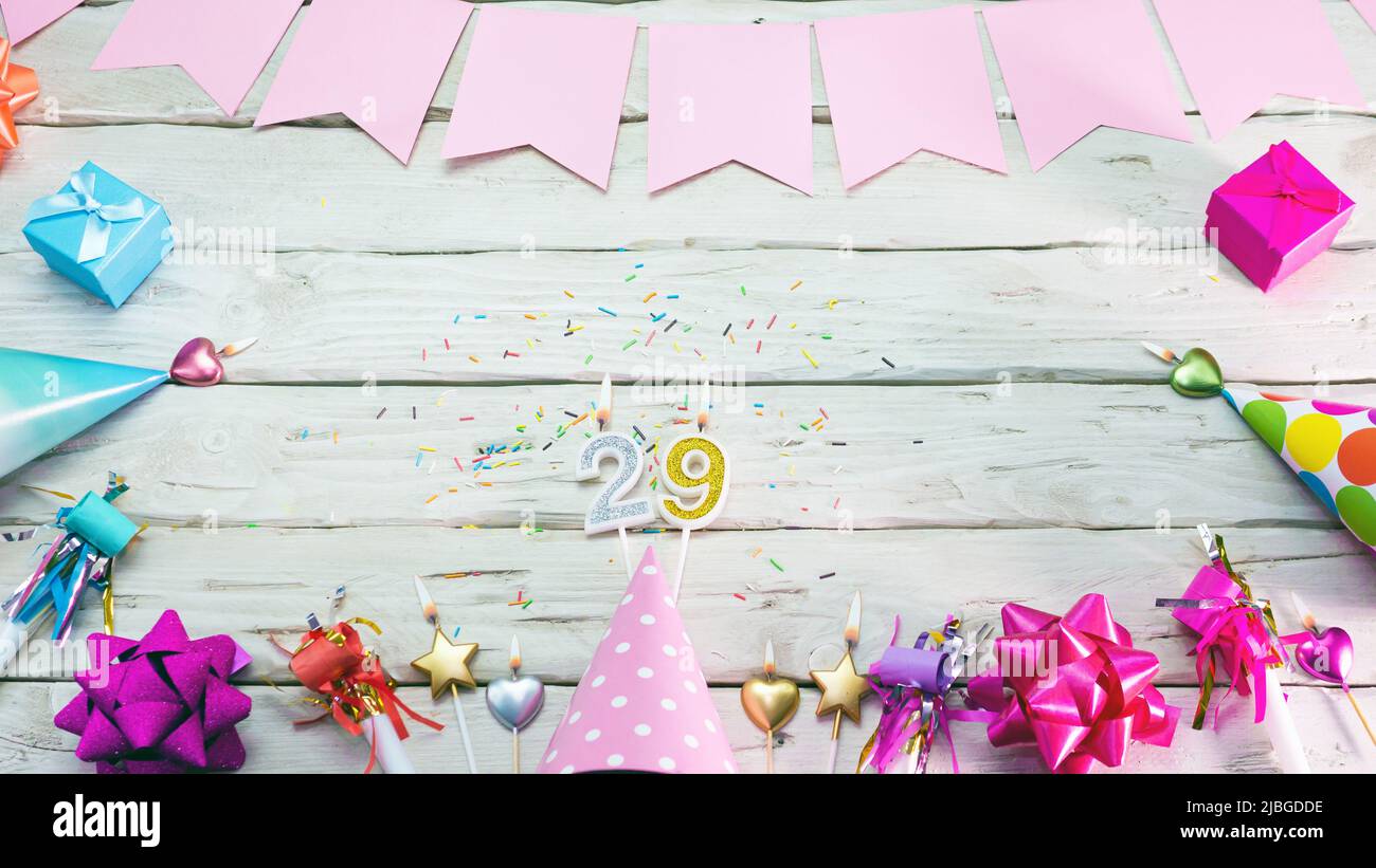 Happy birthday. Copyspace. Beautiful card in pastel pink colors for a woman or a girl. Decorations festive place for your text. Stock Photo