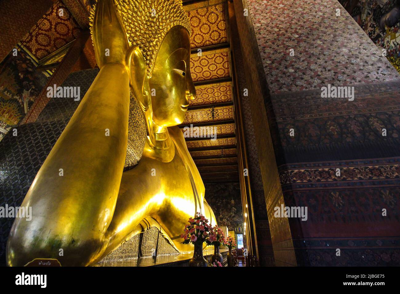 The image of Reclining Buddha in the chapel of Wat Pho, Bangkok, Thailand ( Rattanakosin Island). Stock Photo
