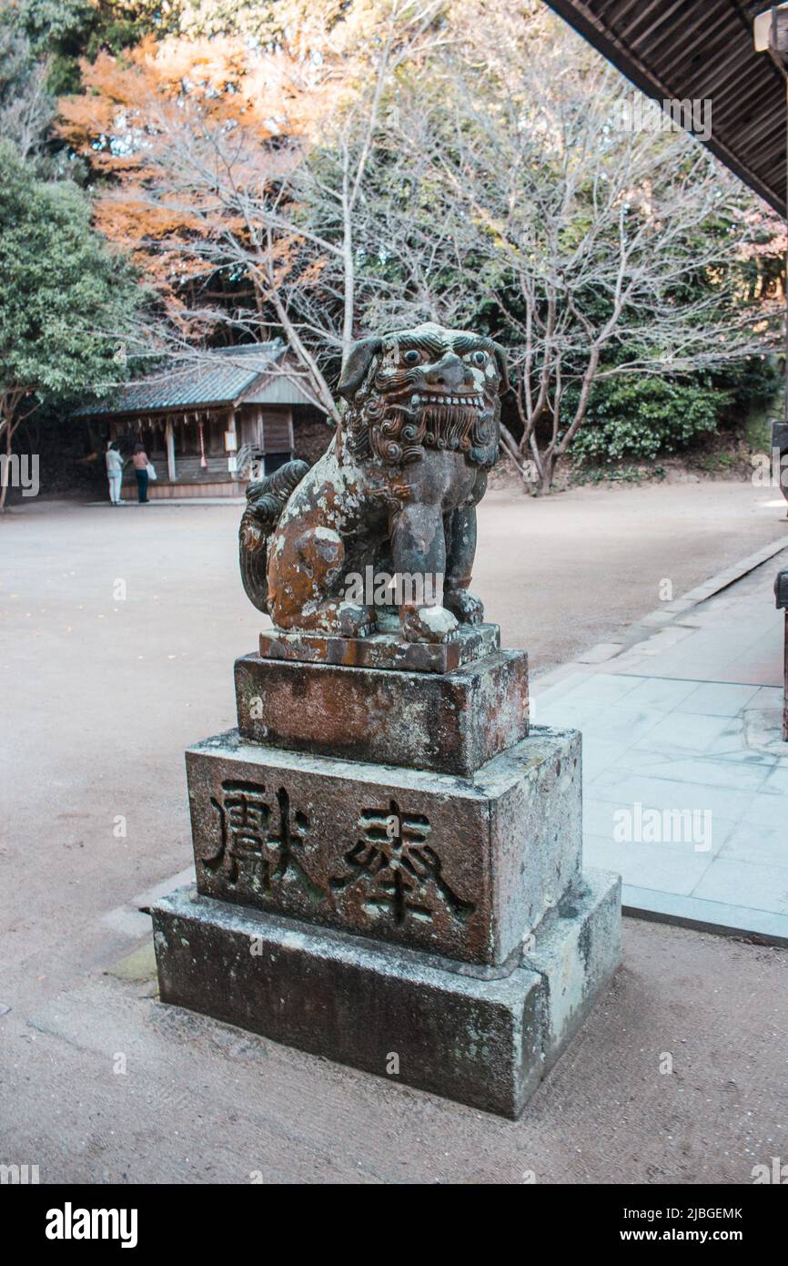 Komainu (lionshaped guardian dog) statue in old shrine in Fukuoka