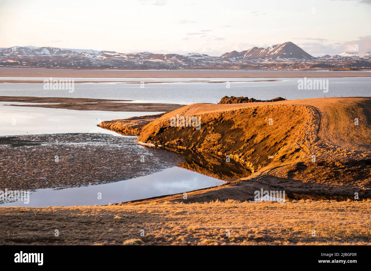 Skútustaðir, Iceland, April 27, 2022: view from an elevated position towards lake Myvatn and the volcanic landscape around it Stock Photo