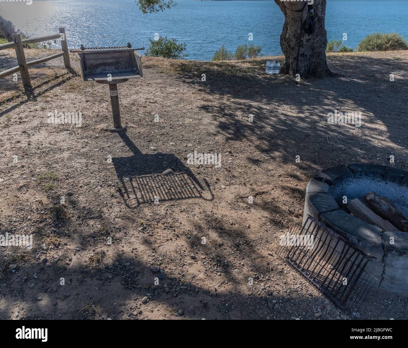 A wide shot of an empty campsite during the daytime. Stock Photo