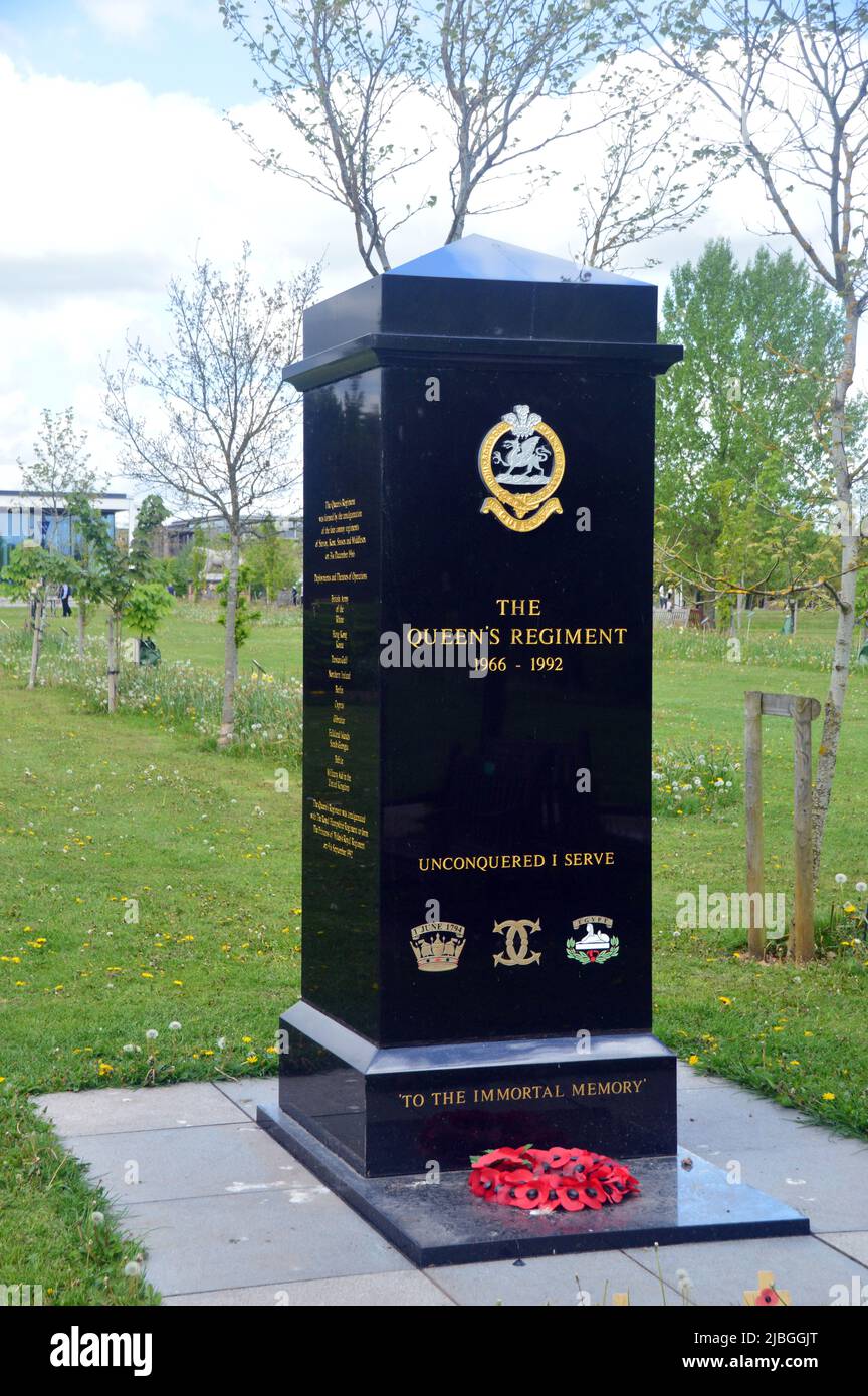 The Polished Black Granite Plinth Memorial Dedicated to Queen's Regiment at the National Memorial Arboretum, Staffordshire, England, UK Stock Photo