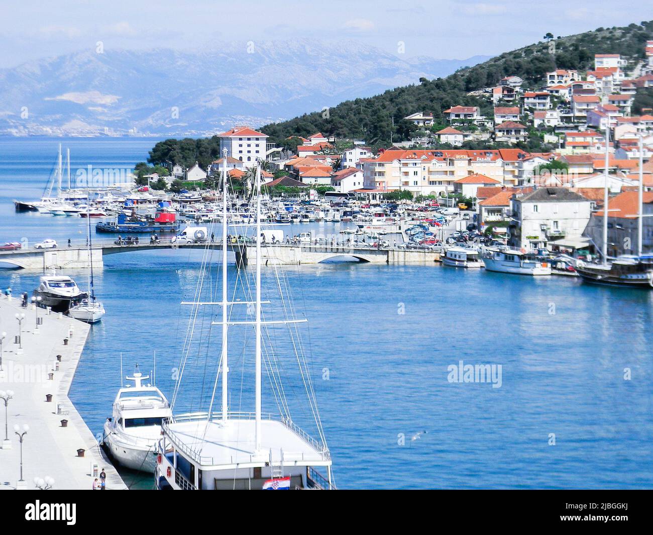 Harbor in Trogir, Croatia. Trogir is on small island between the Croatian mainland & the island of Čiovo. It lies 27 kim (17 miles) west of of Split Stock Photo