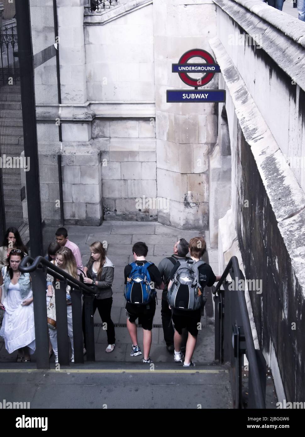 London, United Kingdom - July 10, 2011 : Tourists and local people at the entrance of London Underground (Tube). Stock Photo