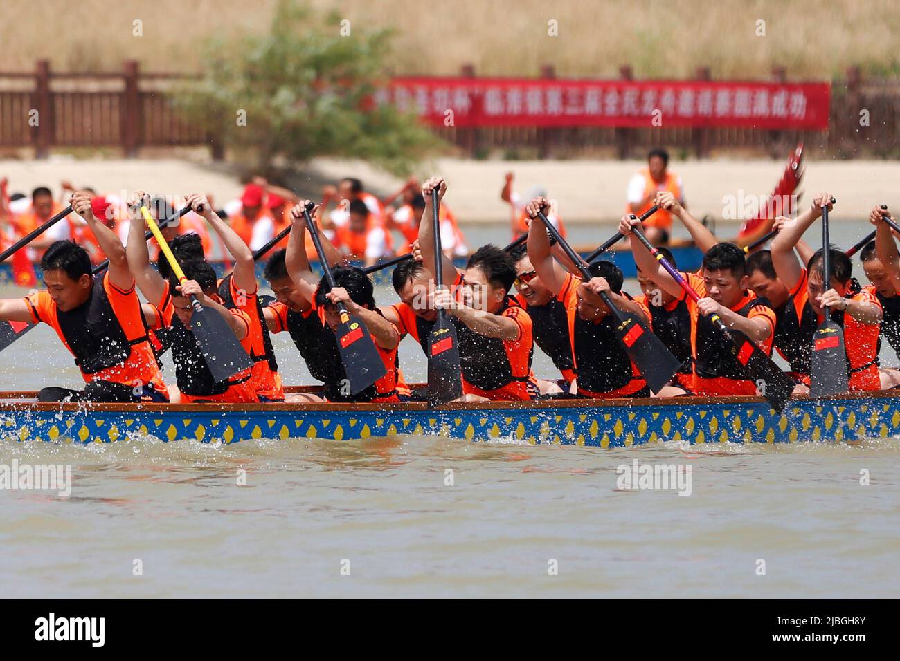 SUQIAN, CHINA - JUNE 3, 2022 - Participants participate in a dragon boat  race at the Water Sports Center in Linhuai Town, Sihong County, Suqian  City, East China's Jiangsu Province, June 3,