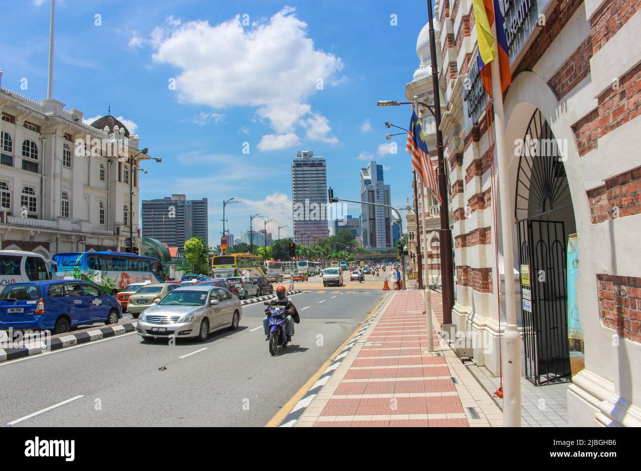 Kuala Lumpur, Malaysia - March 22, 2017: City centre in KL in sunny day. It was taken in front of facade of National Textile Museum on Jaran Raja road Stock Photo