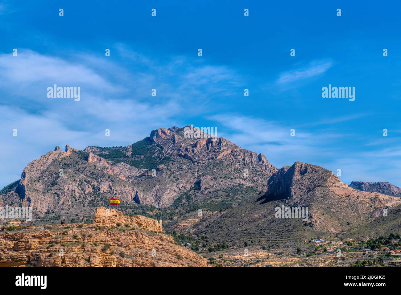 Busot Castle Spain with mountains in historic village tourist attraction near El Campello and Alicante Stock Photo