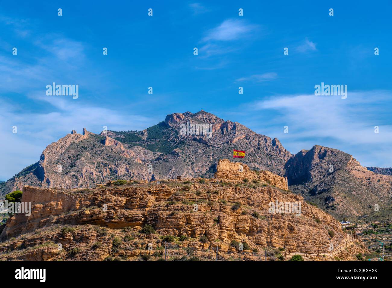 Busot Castle Alicante Spain with mountains in historic village tourist attraction near El Campello Stock Photo