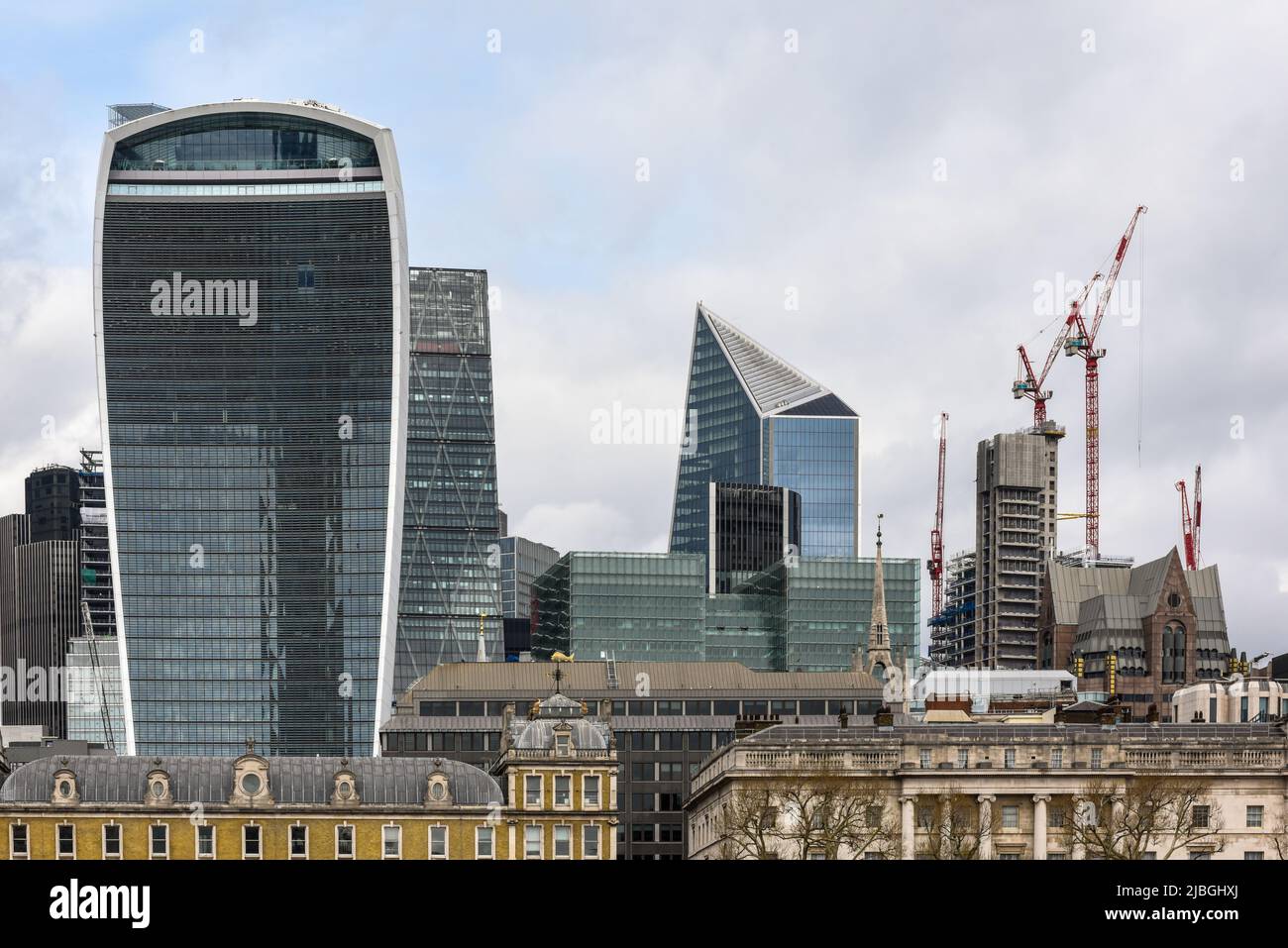 New buildings rise up behind traditional architecture in London city skyline Stock Photo