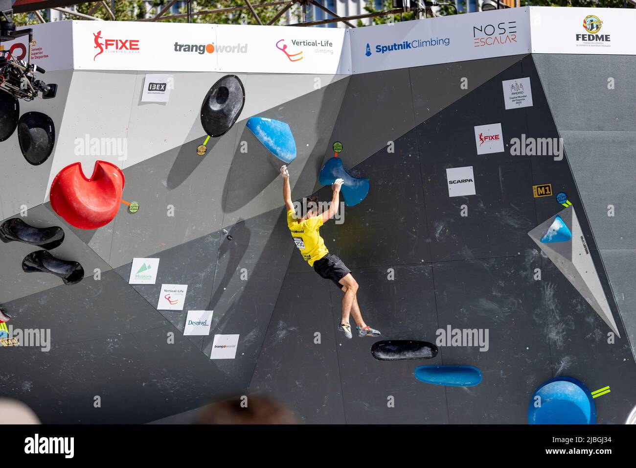 Climbing. Sport. Young person climbing in Block Climbing. Olympic