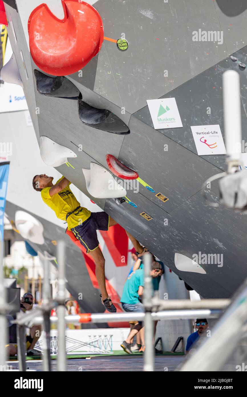 Climbing. Sport. Young person climbing in Block Climbing. Olympic