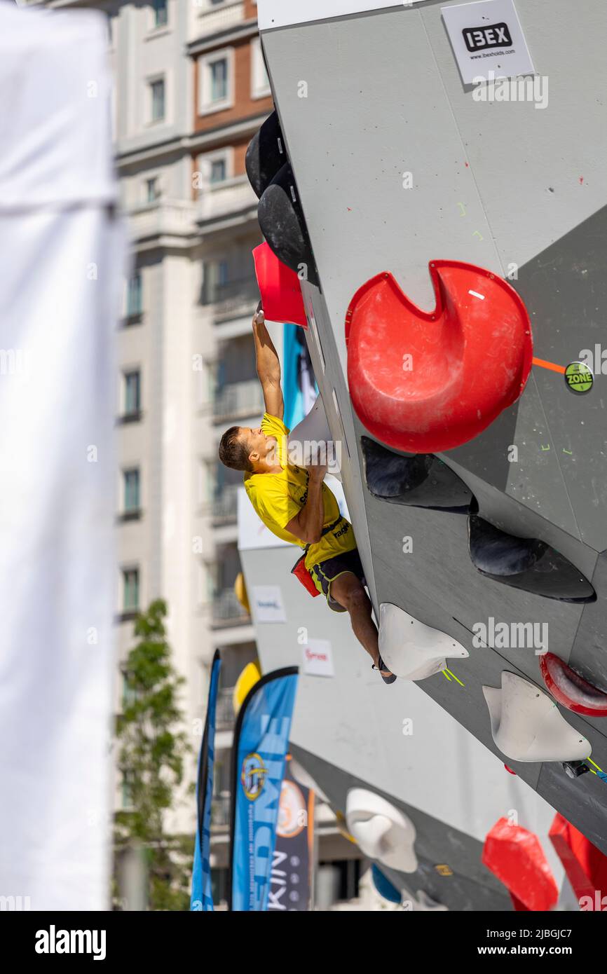 Climbing. Sport. Young person climbing in Block Climbing. Olympic exercise. Olympic Sport