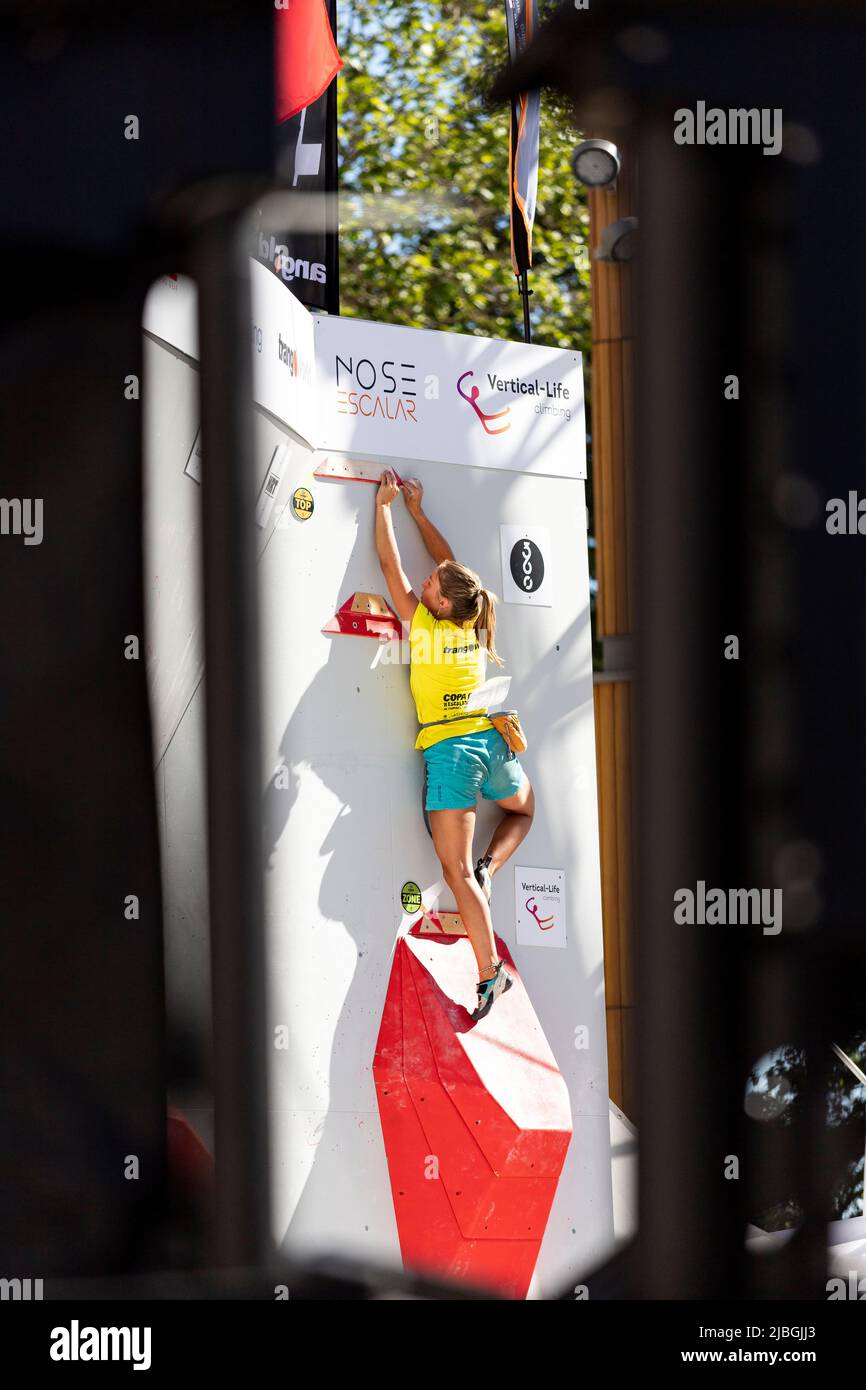 Climbing. Sport. Young person climbing in the Madrid Block Climbing