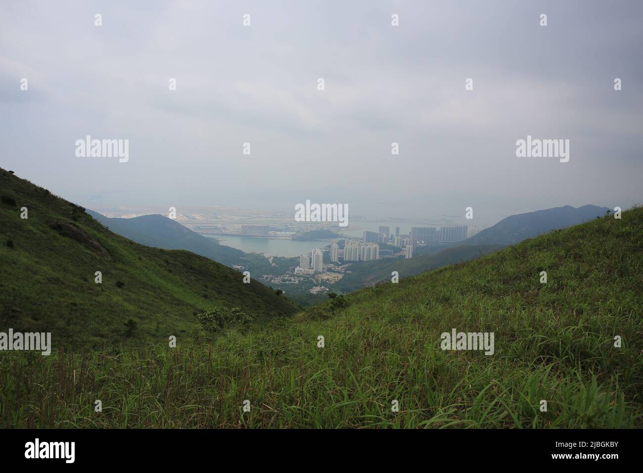peak of Lantau peak in Hong Kong, one of highest mount, with the far view of Tung Chung Stock Photo