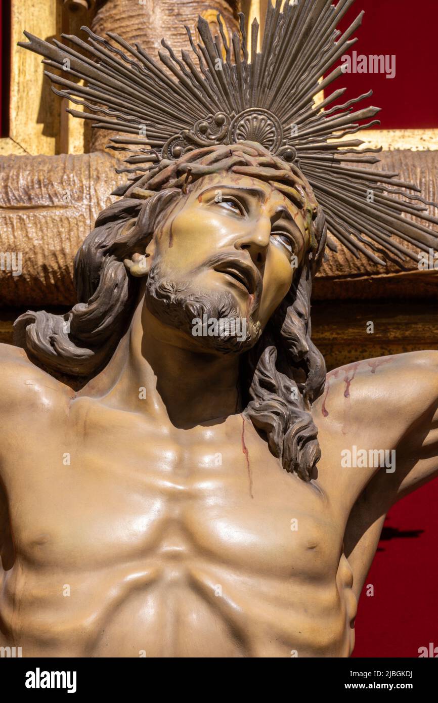 VALENCIA, SPAIN - FEBRUAR 17, 2022: The detail of  Crucifixion statue in the church Basilica de San Vicente Ferrer by  Carmelo Vicent Suria. Stock Photo