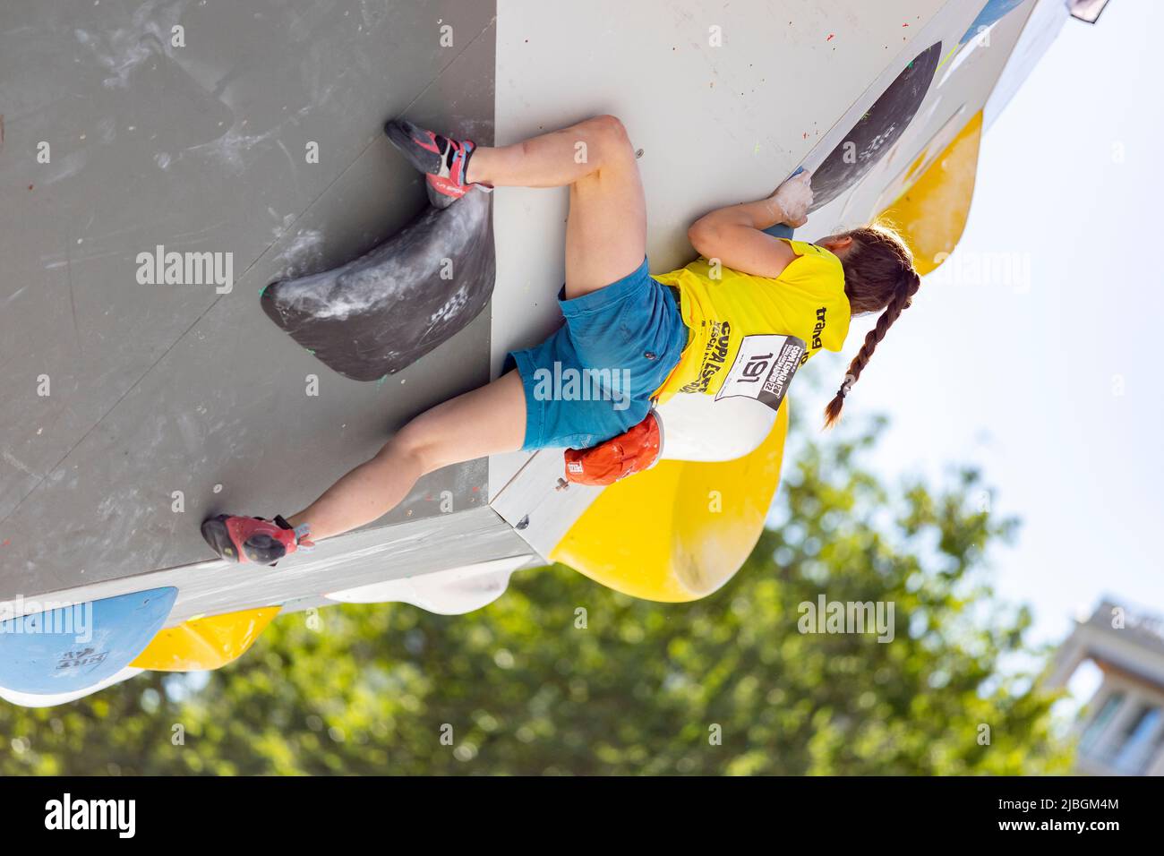 Climbing. Sport. Young person climbing in the Madrid Block Climbing