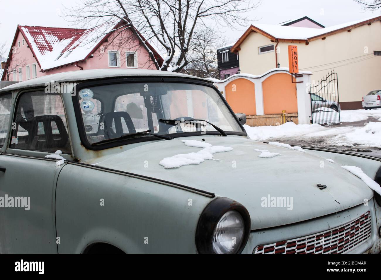 Brasov, Romania - February 9, 2017 : Parked old European car (mint green colour) in winter. Stock Photo