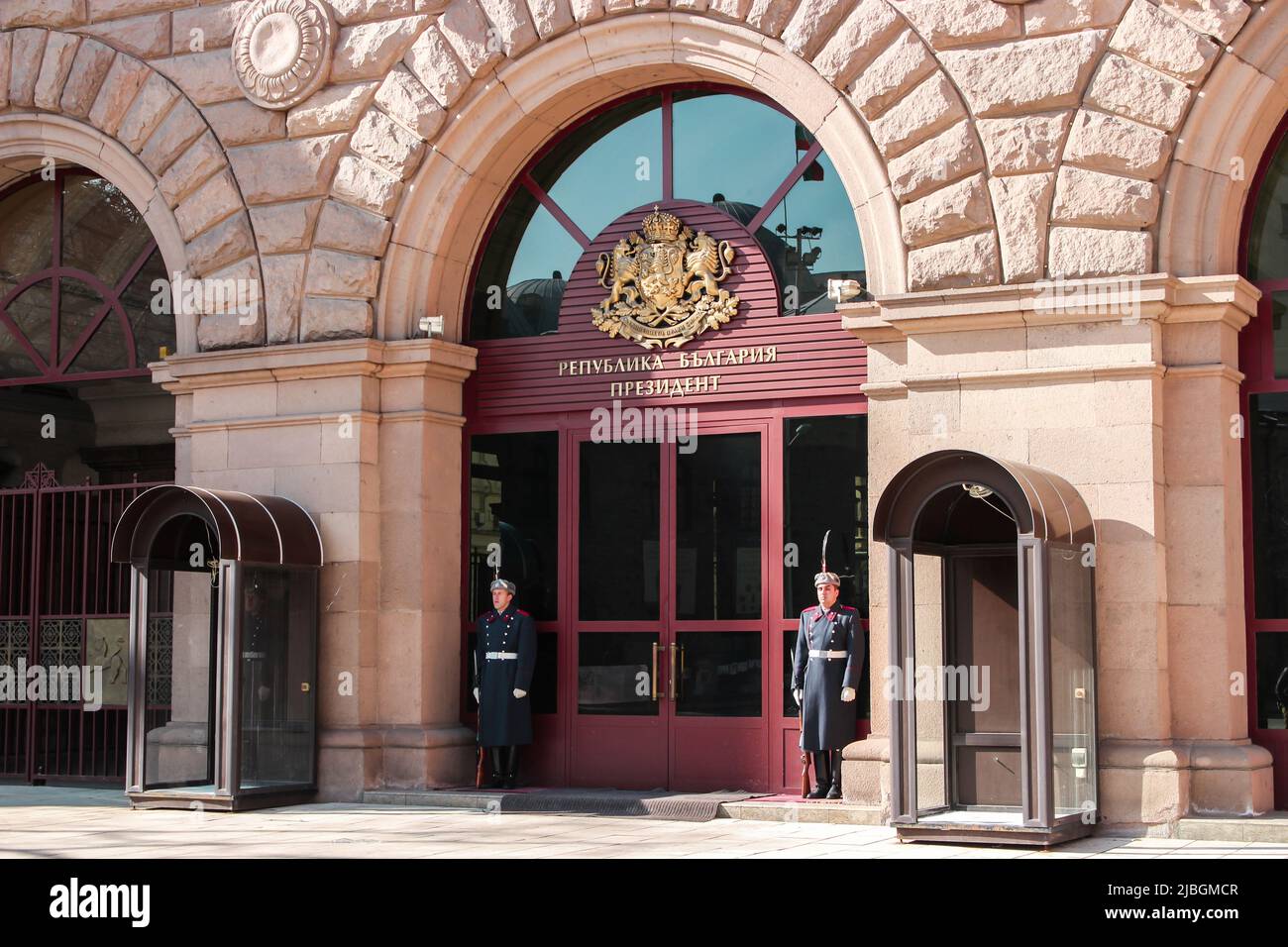 Sofia, Bulgaria - Feb. 14, 2017 : The Presidency building in Sofia, Bulgaria. Entrance is guarded by security men. Translation : Republic of Bulgaria Stock Photo
