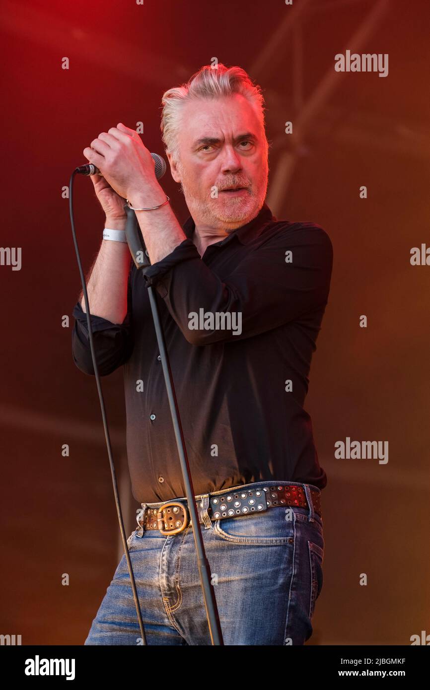 Paul McLoone, lead singer of The Undertones performing at Wychwood