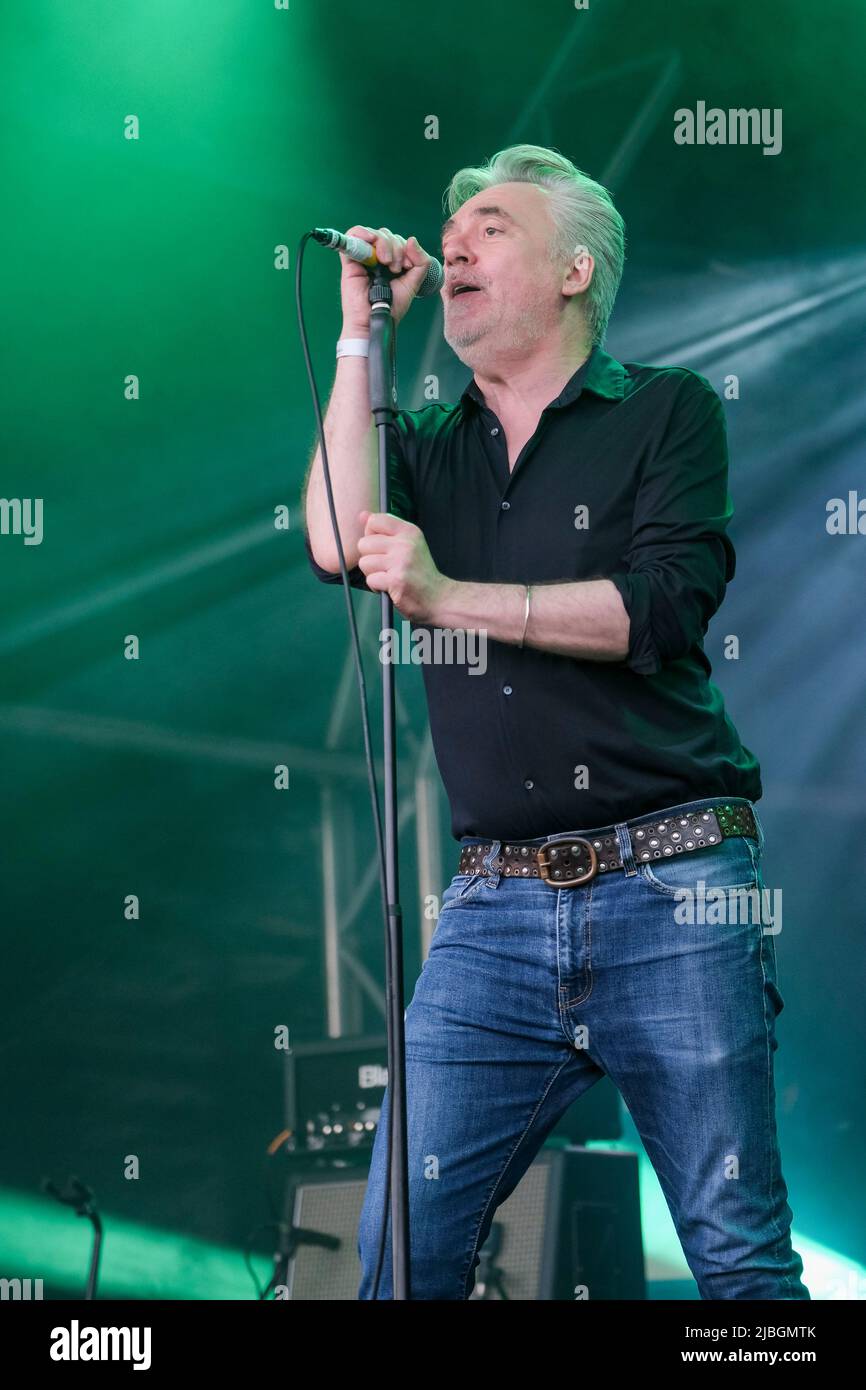 Paul McLoone, lead singer of The Undertones performing at Wychwood