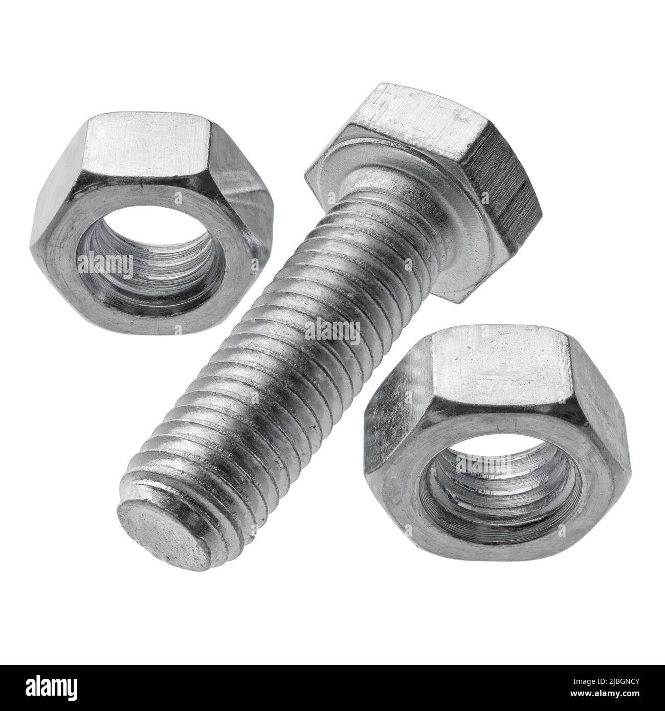 Group of two steel nuts and one bolt arranged as percent sign, isolated on white background Stock Photo