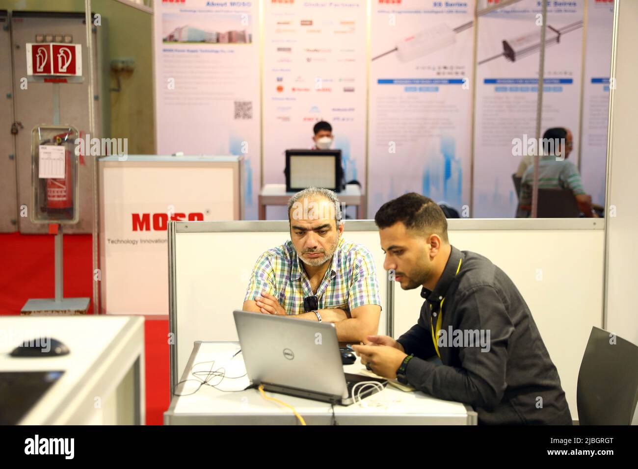 Cairo, Egypt. 5th June, 2022. A visitor inquires at a booth during the China Homelife Egypt held in Cairo, Egypt, on June 5, 2022. The fair, China Homelife Egypt, kicked off on Sunday and will be open until June 7 at the Cairo International Convention Center, featuring Chinese products in nine segments, including agriculture and food, building materials, consumer electronics, furniture, household appliances, textiles and clothing, household products, gifts, and lamps. Credit: Ahmed Gomaa/Xinhua/Alamy Live News Stock Photo