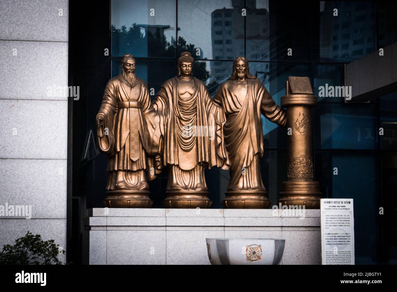 Seoul, South Korea - Sep 19 2018 : Confucius, Buddha, Christ & Quran statues at Family Federation for World Peace and Unification Cheonbokgung Church Stock Photo
