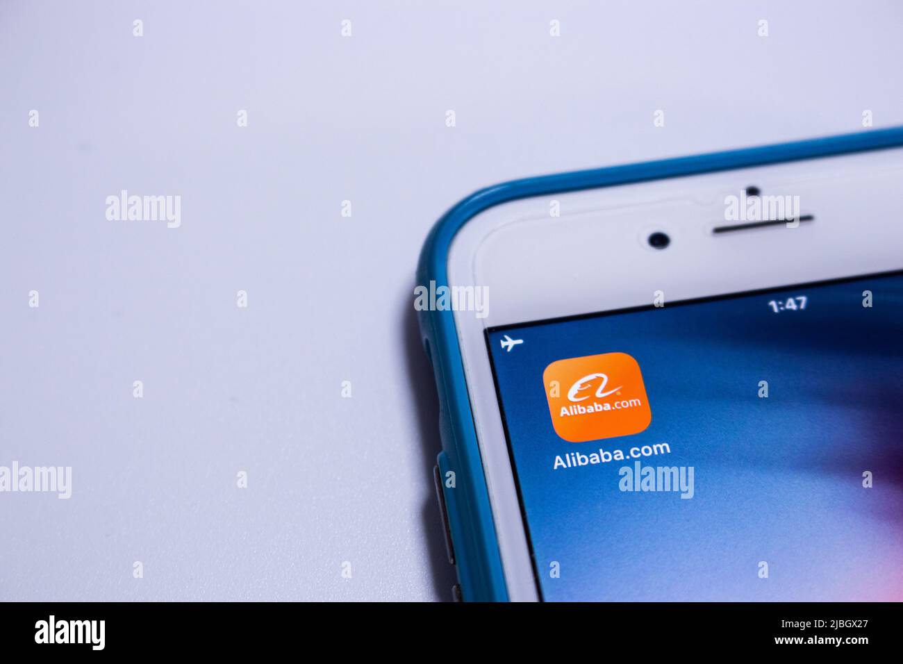 Alibaba app on iPhone. Alibaba Group, Chinese multinational conglomerate holding, is the world's largest retailer and e-commerce company. Stock Photo