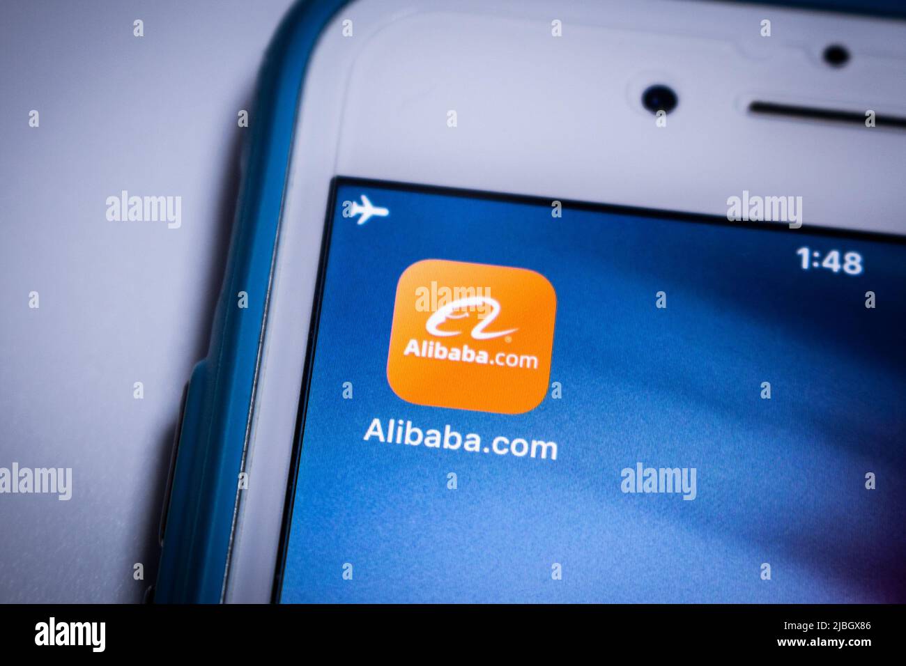 Alibaba app on iPhone. Alibaba Group, Chinese multinational conglomerate holding, is the world's largest retailer and e-commerce company. Stock Photo