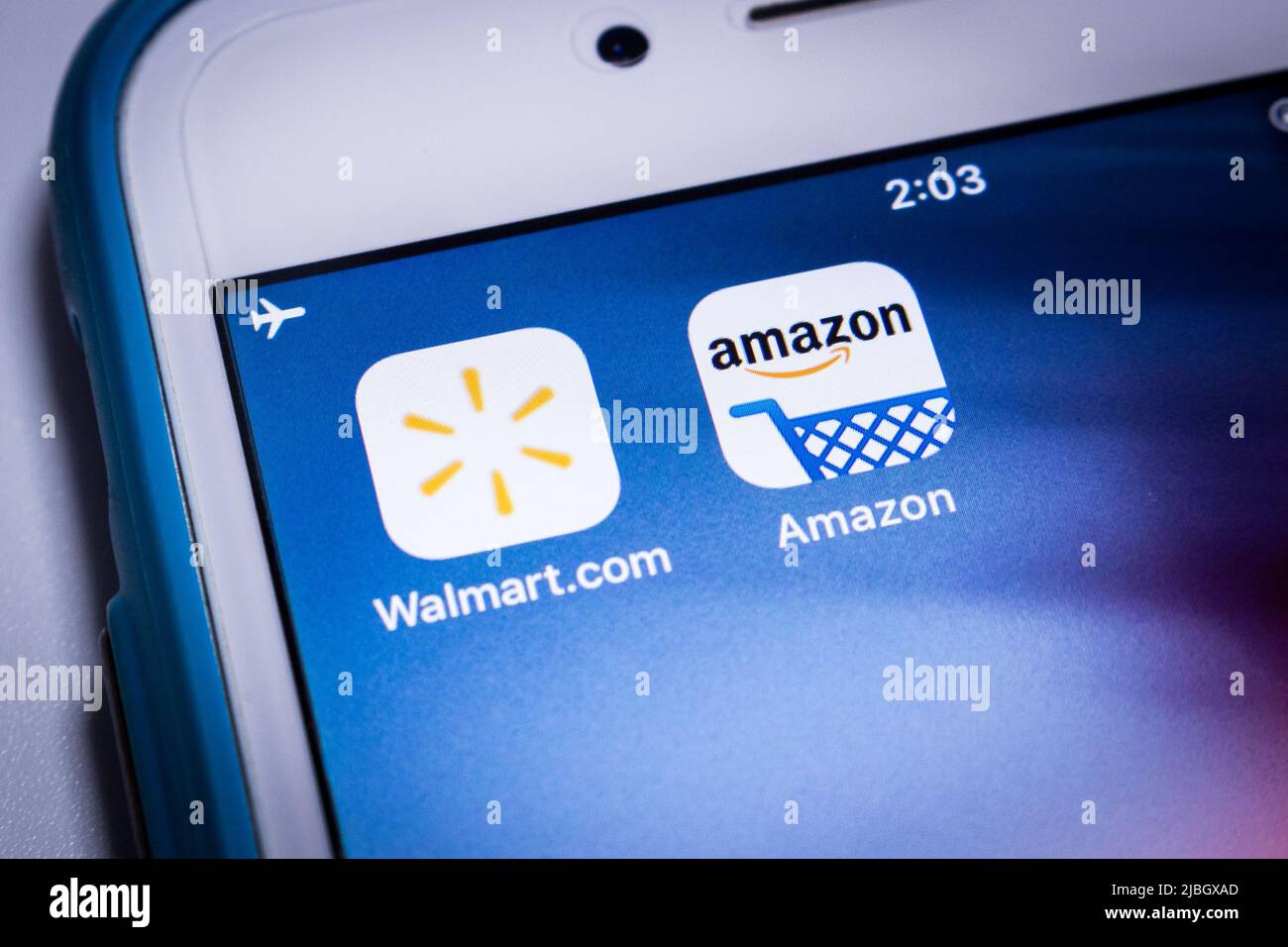 Kumamoto, Japan - Dec 13 2019: Walmart & Amazon, two big giants of US retail industry, on an iPhone. Stock Photo