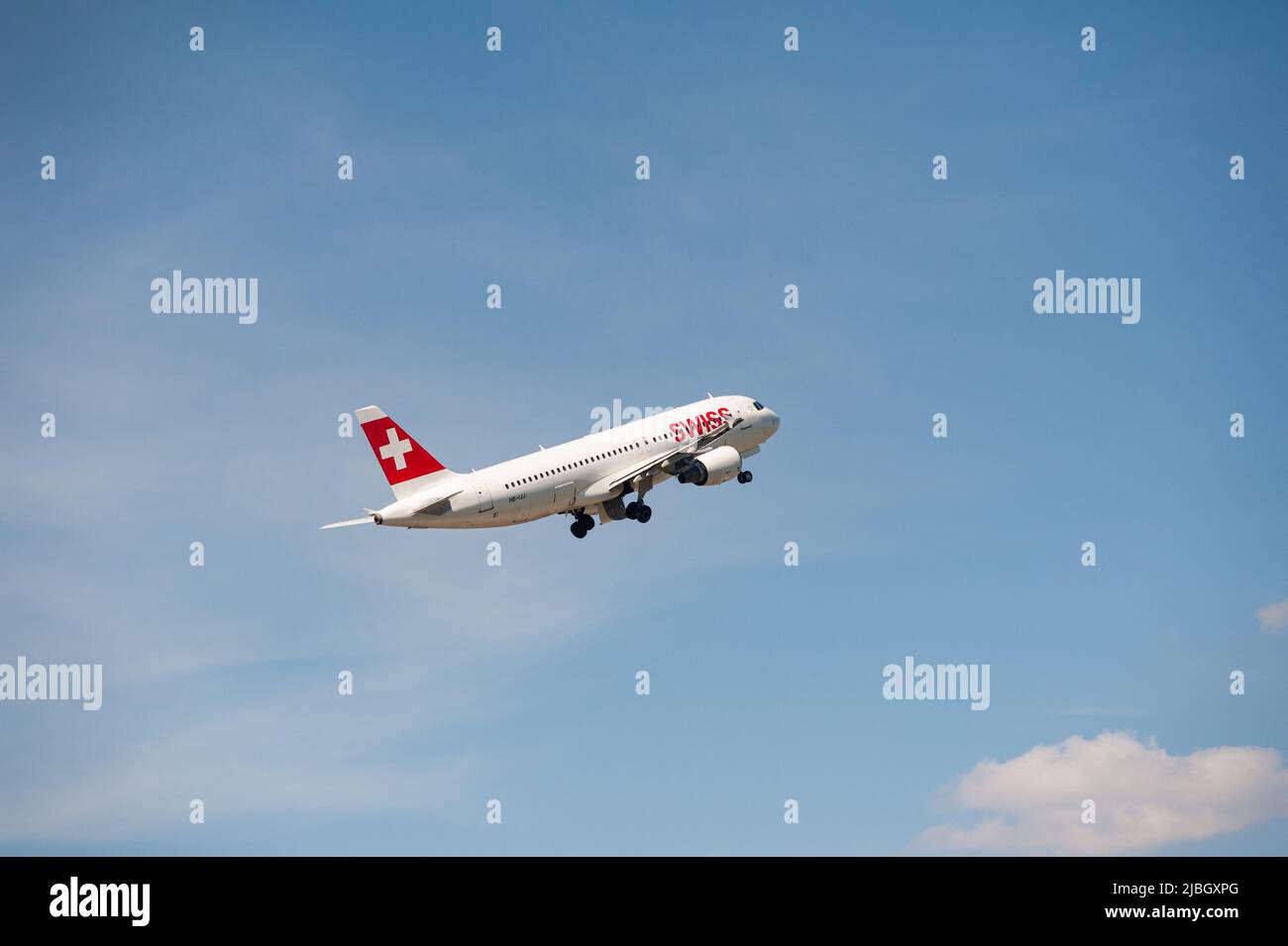 03.06.2022, Berlin, Germany, Europe - A Swiss Airlines Airbus A320 passenger aircraft takes off from Berlin Brandenburg Airport BER. Stock Photo