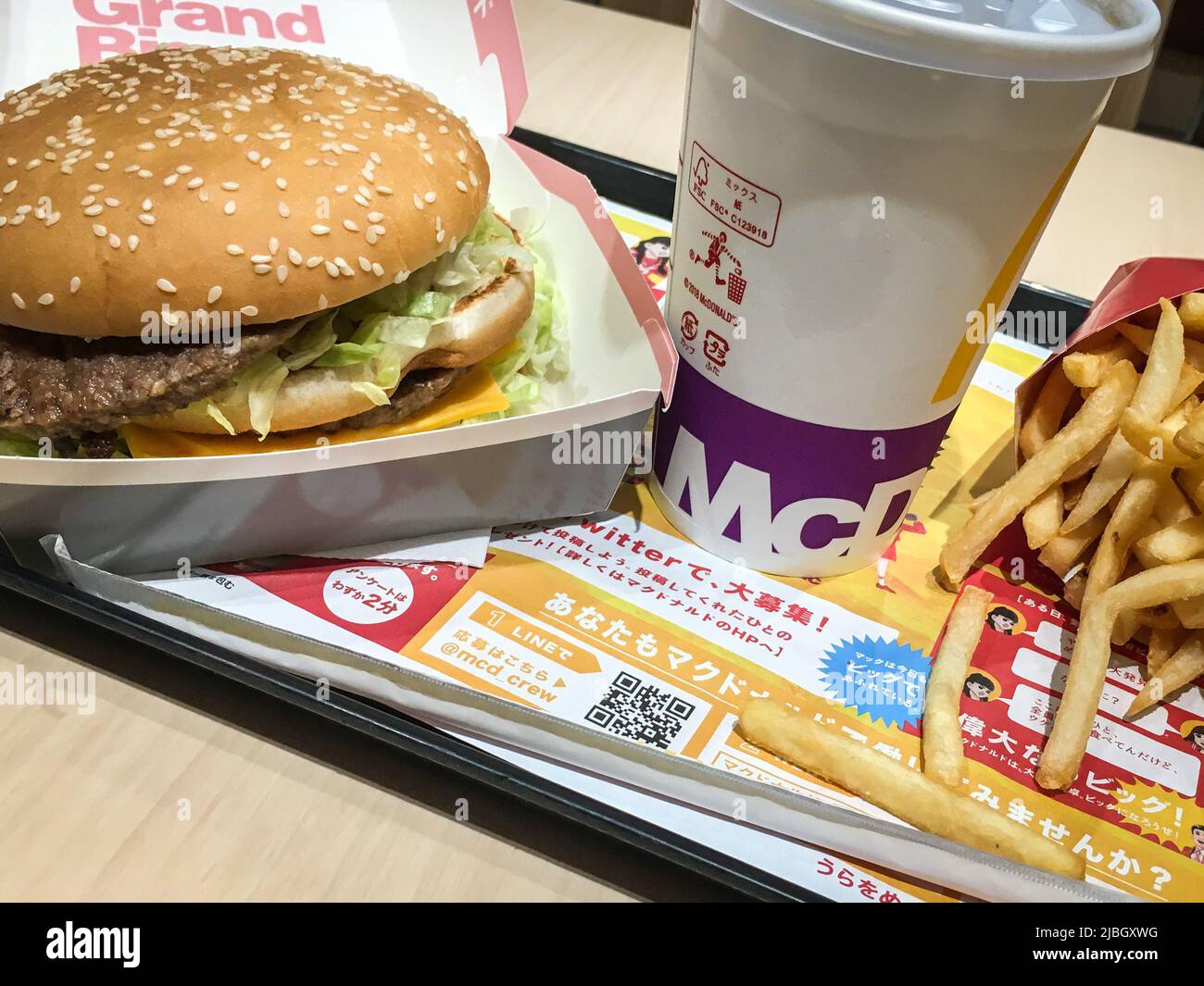 Kumamoto, Japan - Apr 18, 2019 : The close up image of Grand Big Mac menu (burger, drink and potato) on tray, Mcdonald's restaurant, Japan. Stock Photo