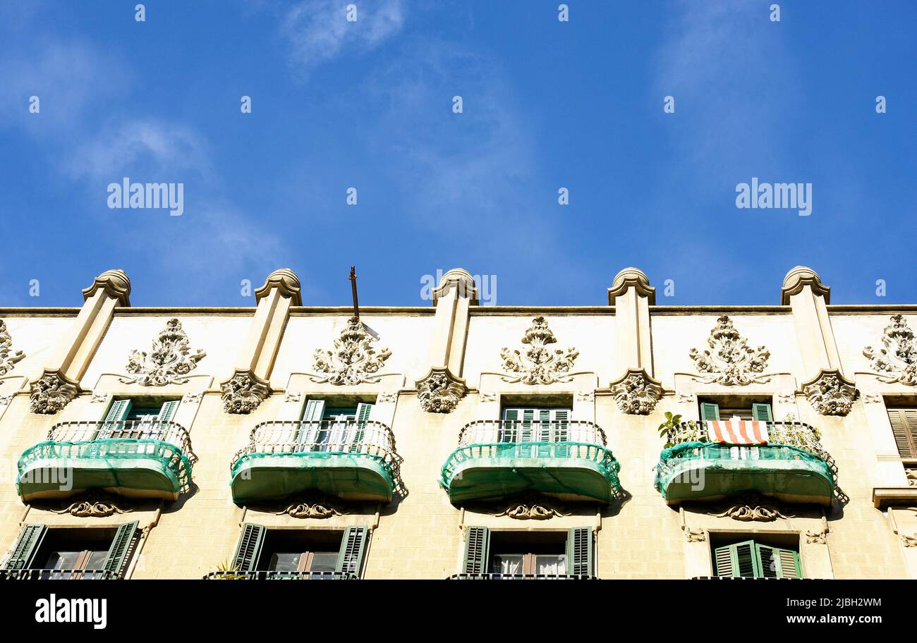 Facade and cornice of a typical Catalan modernism building in Barcelona, Catalunya, Spain, Europe Stock Photo