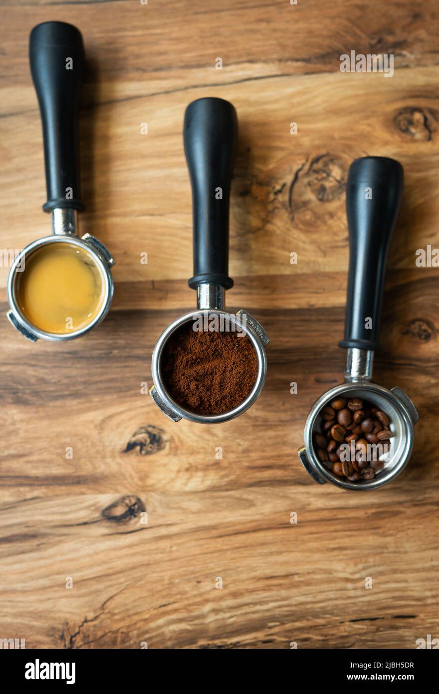Different processes of preparing coffee by a barista in a coffee shop
