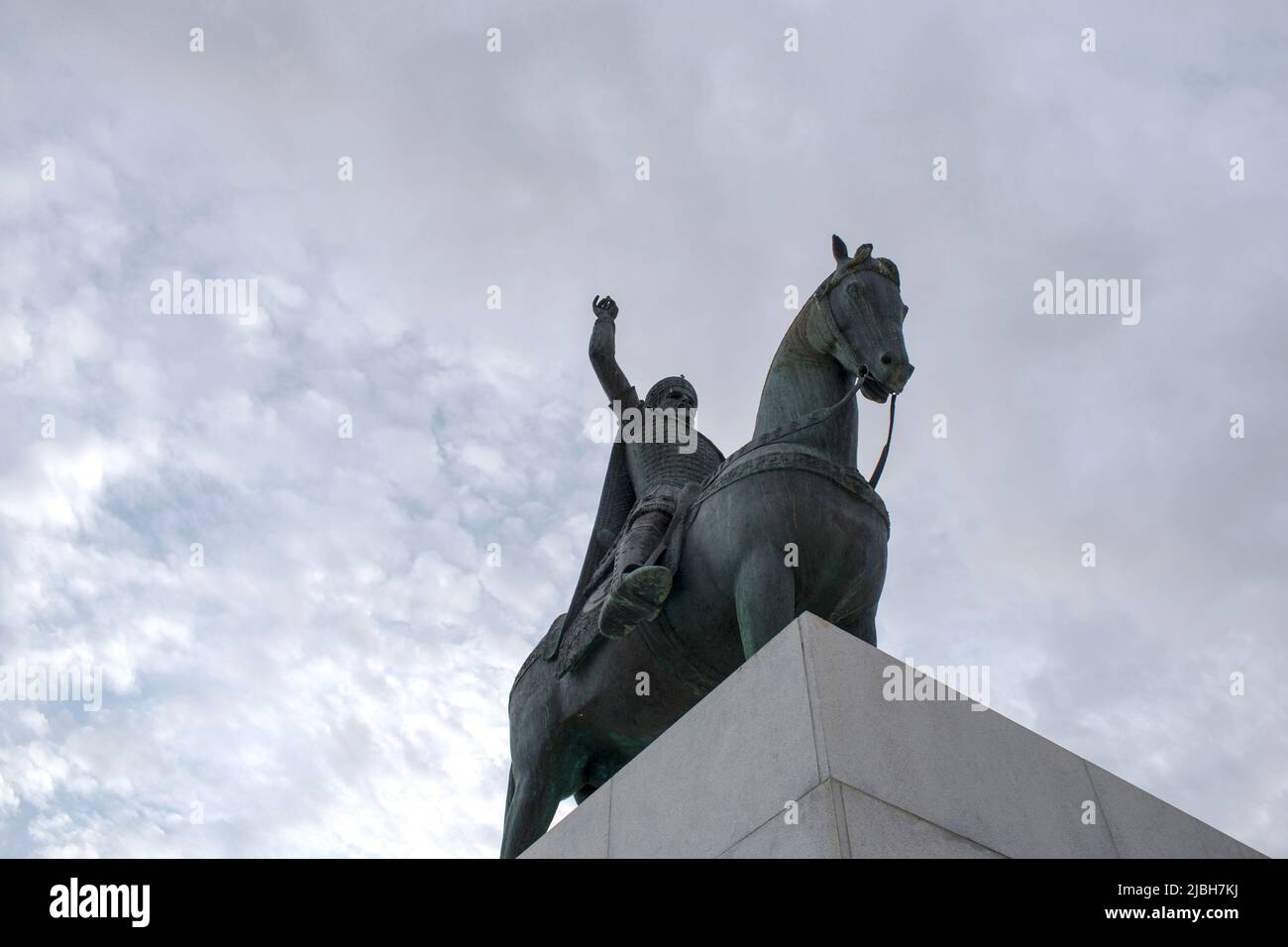 Statue of the Last Byzantine Emperor (Constantine XI Palaiologos) riding a horse, located at the seaside of Palaio Faliro, Athens, Greece Stock Photo