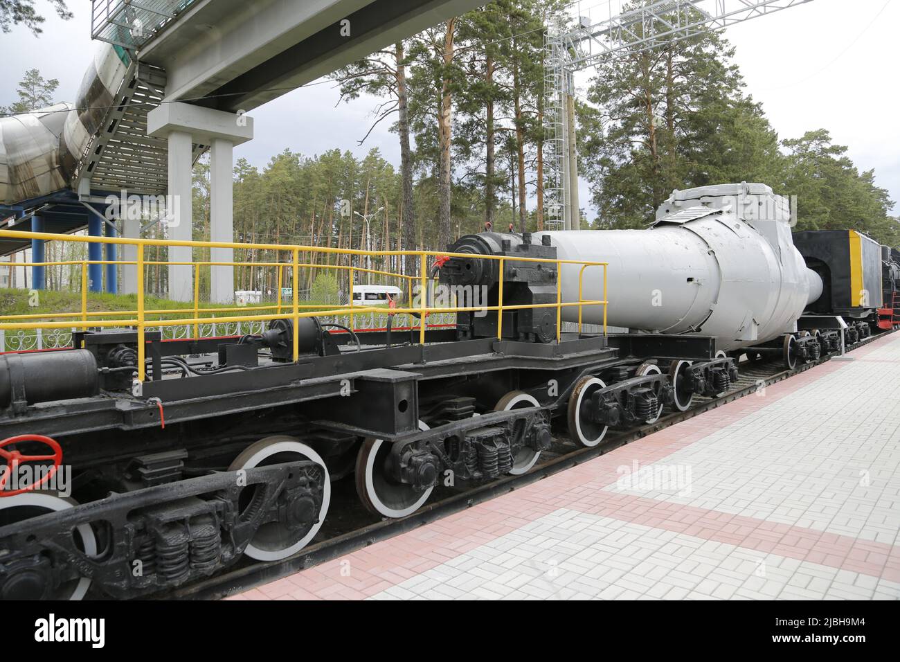 Russian freight train with mixer for transportation of liquid iron, photographed in Museum for Railway Technology Novosibirsk; torpedo car, Чугуновоз Stock Photo