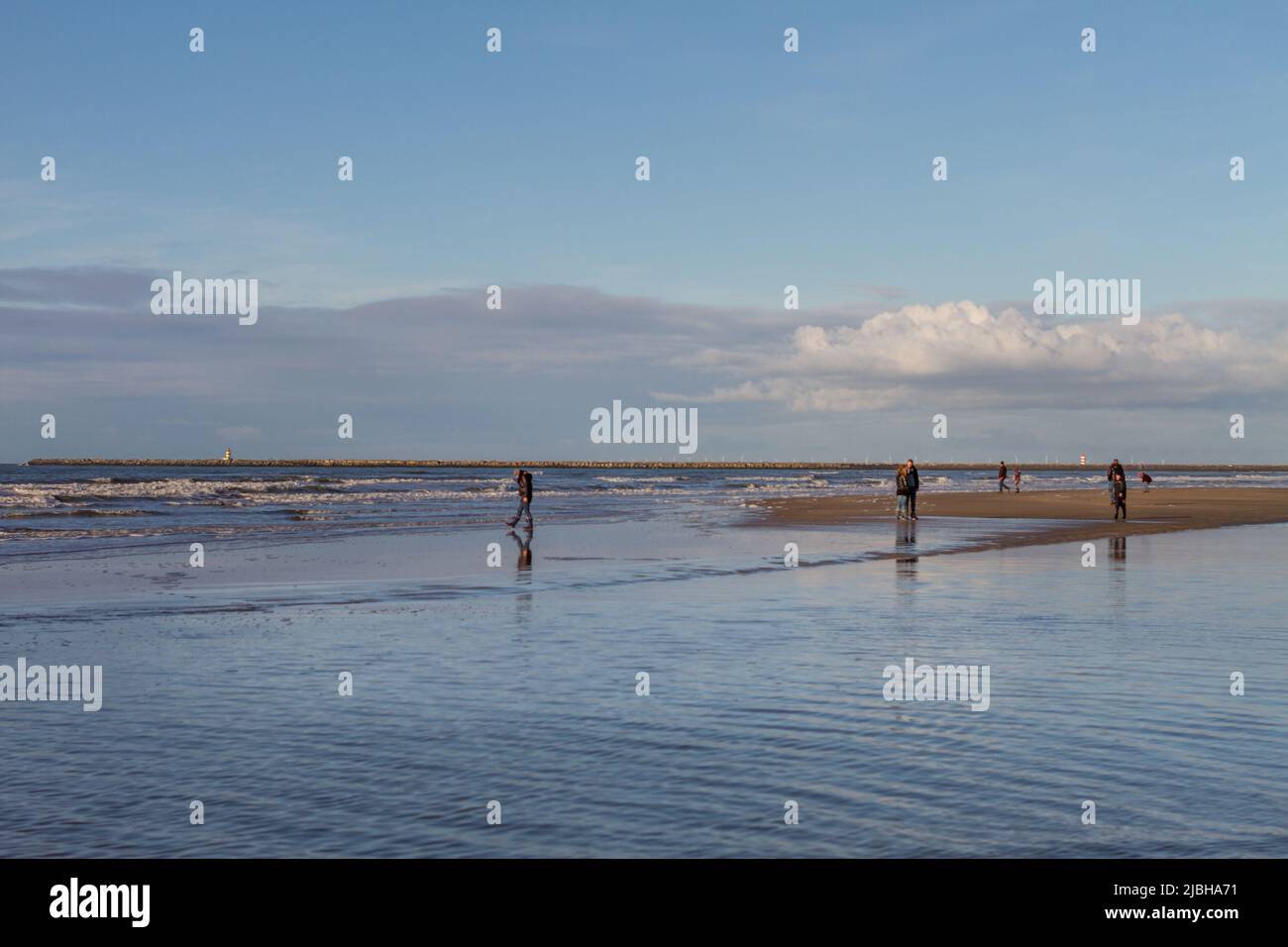 People walking in the shore of Zandvoort beach , Holland Stock Photo ...