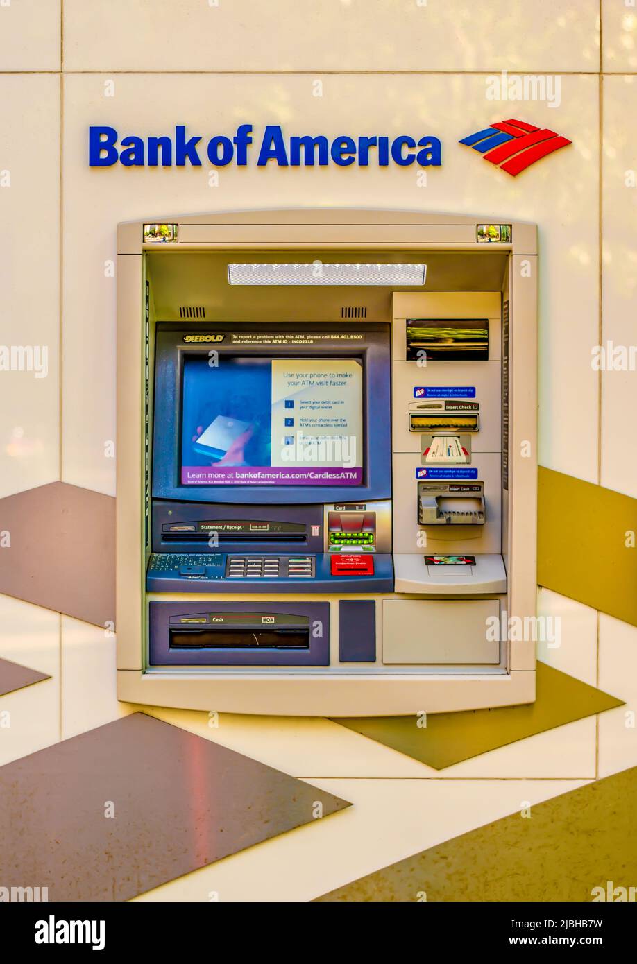 Charlotte, NC USA - April 26, 2019:  Medium closeup vertical shot of 'Bank of America' ATM machine outside of the bank in uptown. Stock Photo