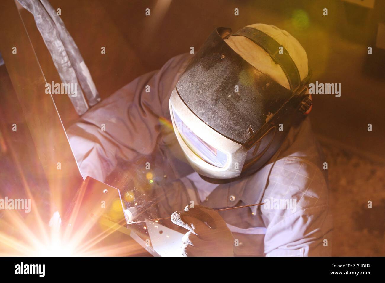 Metal worker doing welding work in his Stock Photo Alamy