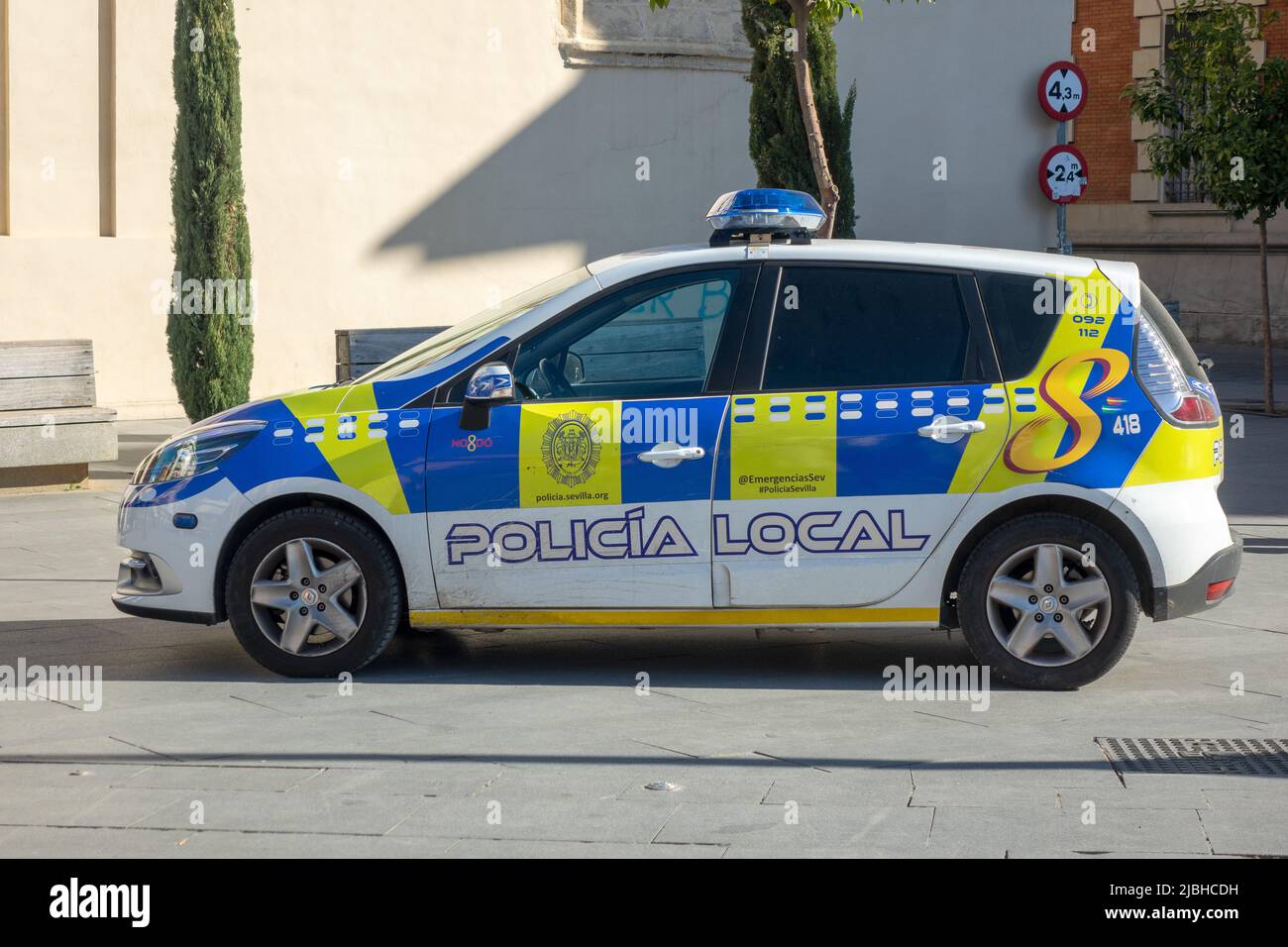 Local Seville Spain Renault Police Car Vehicle Parked In The City Centre Of Seville Spain, Policia Local Municipal Police Force Stock Photo