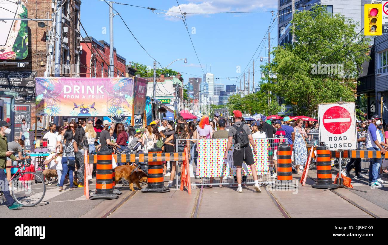 Crowd Of People Behind The Barrier Marking The Start Area Of The Do