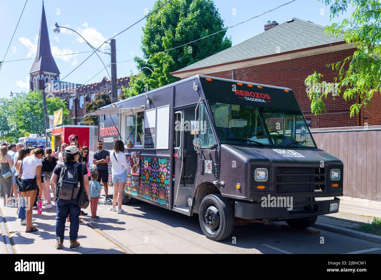 People lining-up in a food truck of Rebozo Taqueria during the Do West Festival. Stock Photo