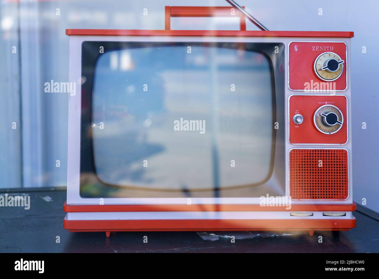 A vintage analog TV set is displayed in a retail store in the Little Portugal district. Stock Photo