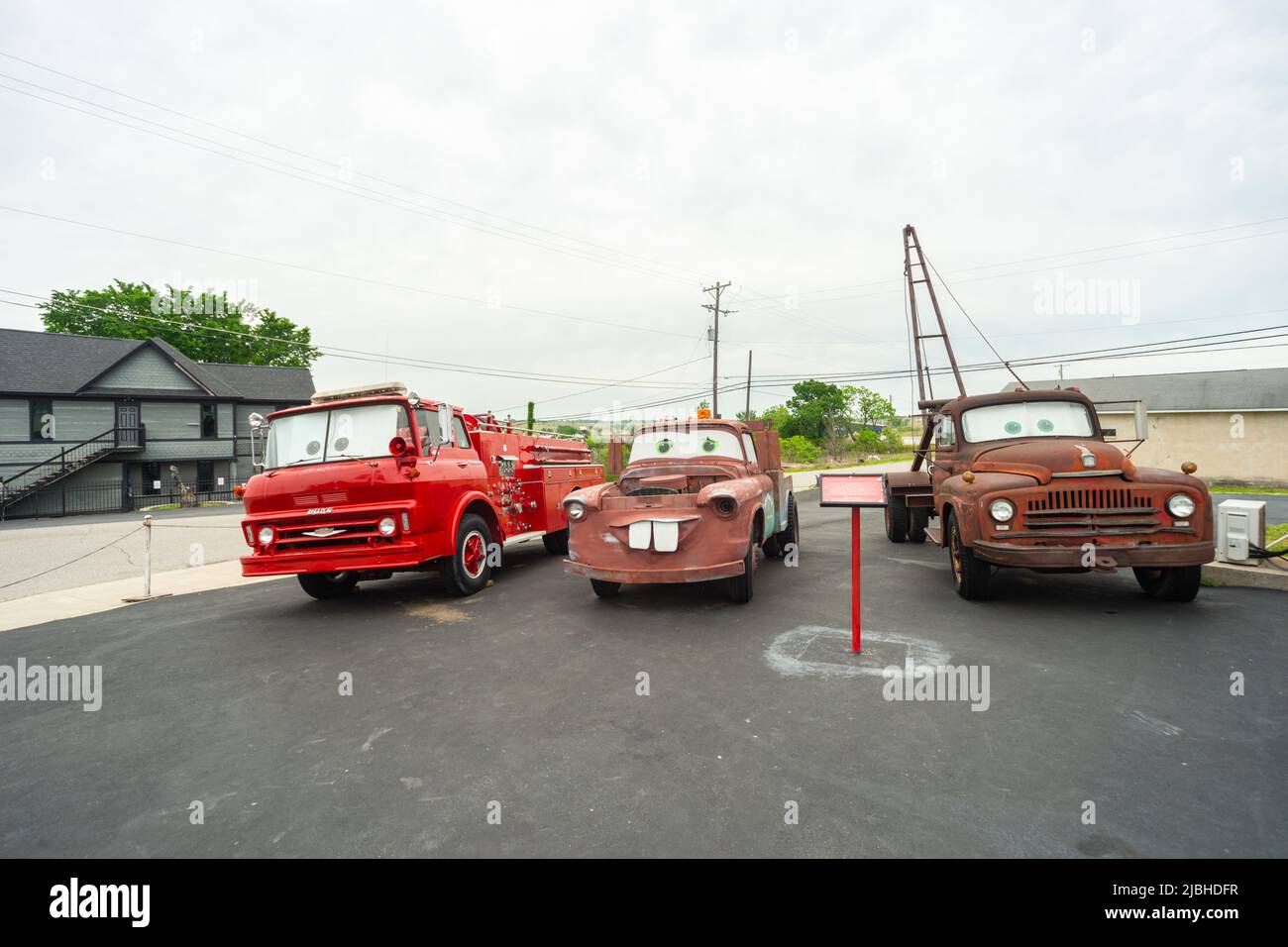 Vehicles on the forecourt of Cars on the Route, Galena KS, USA. Former Kan-O-Tex service station. Chevrolet Spartan Fire truck and two tow-trucks Stock Photo